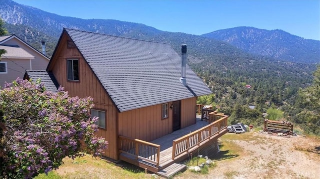15440 Shasta Way, Pine Mountain Club, CA 93225 - view of side of home featuring a deck with mountain view