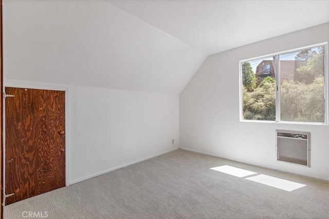15440 Shasta Way, Pine Mountain Club, CA 93225 - additional living space featuring carpet floors, vaulted ceiling, and heating unit