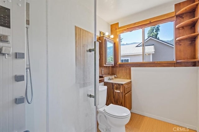 15440 Shasta Way, Pine Mountain Club, CA 93225 - full bath with vanity, a stall shower, and wood finished floors