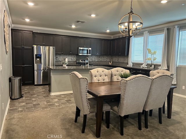 16654 Emerson Ln, Fontana, CA 92336 - carpeted dining space featuring a chandelier, ornamental molding, and recessed lighting
