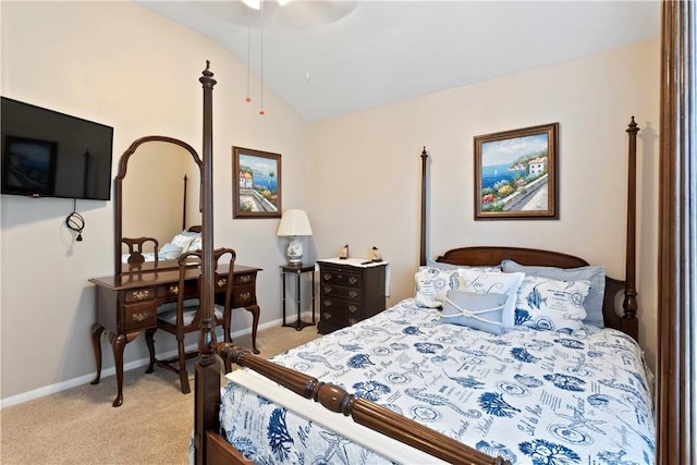 bedroom featuring lofted ceiling, light colored carpet, and baseboards