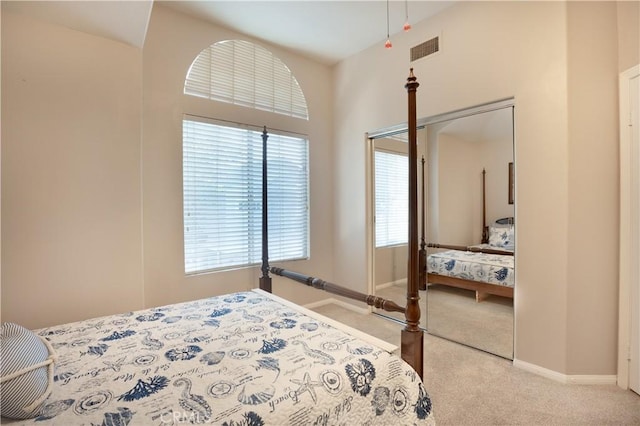 carpeted bedroom with baseboards