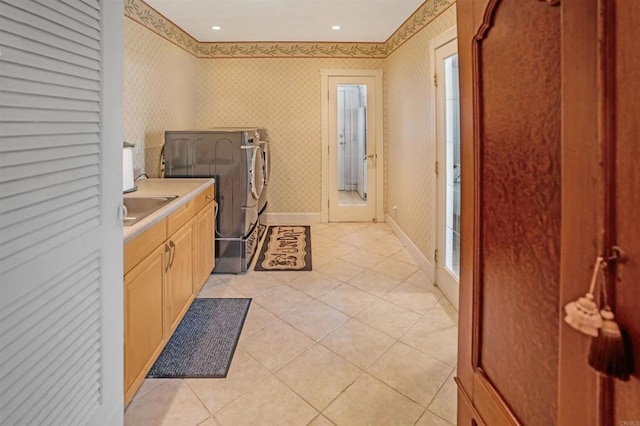 5221 Olive Hill Rd, Fallbrook, CA 92028 - washroom with washing machine and clothes dryer, wallpapered walls, light tile patterned floors, baseboards, and cabinet space