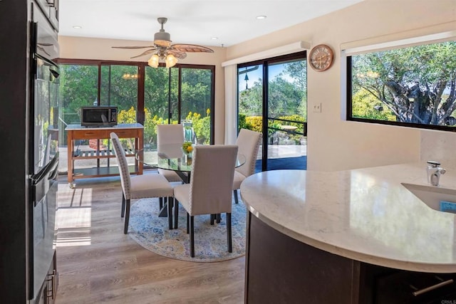 5221 Olive Hill Rd, Fallbrook, CA 92028 - dining room featuring a ceiling fan, wood finished floors, and recessed lighting