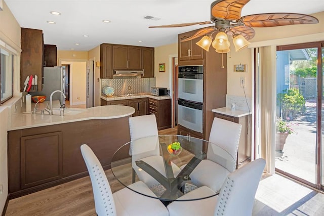 5221 Olive Hill Rd, Fallbrook, CA 92028 - dining area featuring a ceiling fan, light wood-type flooring, and recessed lighting