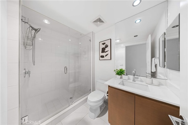 full bathroom featuring toilet, a shower stall, recessed lighting, vanity, and tile patterned floors