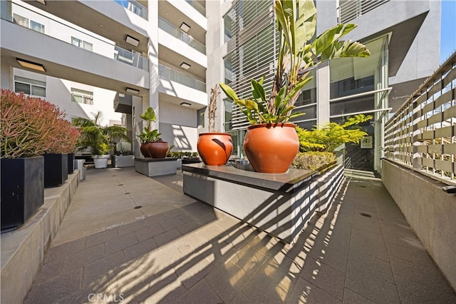 view of home's community with a patio