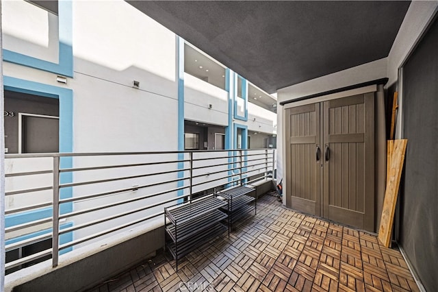 view of patio with a balcony