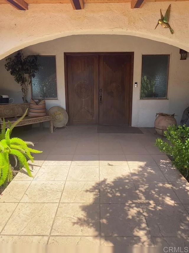 30603 Roadrunner Rdg, Valley Center, CA 92082 - doorway to property featuring stucco siding
