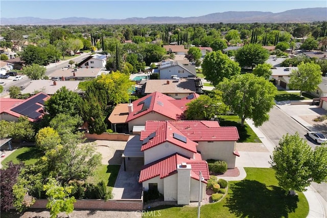 aerial view of residential area with a mountain backdrop
