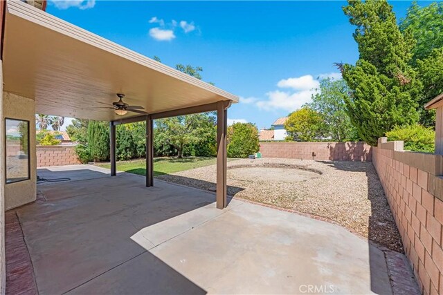 view of patio / terrace with ceiling fan and a fenced backyard
