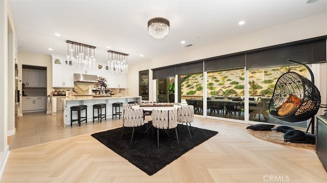 8798 Justify Dr, Rancho Cucamonga, CA 91701 - dining room with a chandelier and recessed lighting