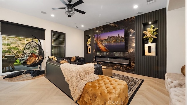 8798 Justify Dr, Rancho Cucamonga, CA 91701 - home theater room with a ceiling fan, recessed lighting, and a high end fireplace