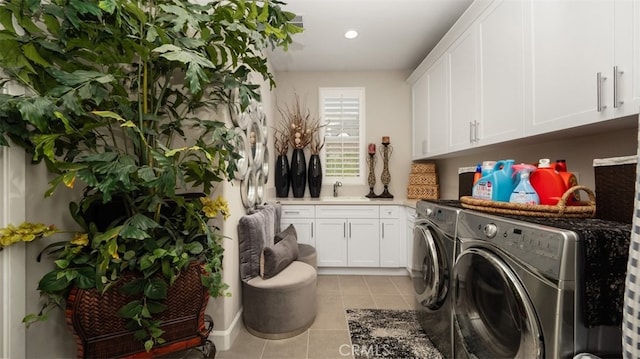 8798 Justify Dr, Rancho Cucamonga, CA 91701 - washroom featuring separate washer and dryer, cabinet space, light tile patterned floors, and recessed lighting