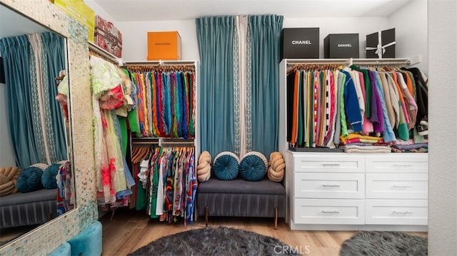 8798 Justify Dr, Rancho Cucamonga, CA 91701 - walk in closet featuring wood finished floors