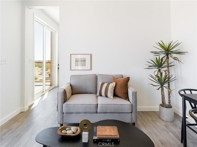 1375 Fortuna Ave, Landers, CA 92285 - sitting room featuring wood finished floors and baseboards