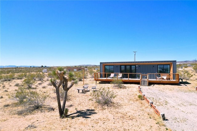 1375 Fortuna Ave, Landers, CA 92285 - view of front of house featuring a deck