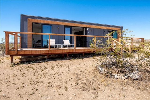 1375 Fortuna Ave, Landers, CA 92285 - rear view of house with a wooden deck