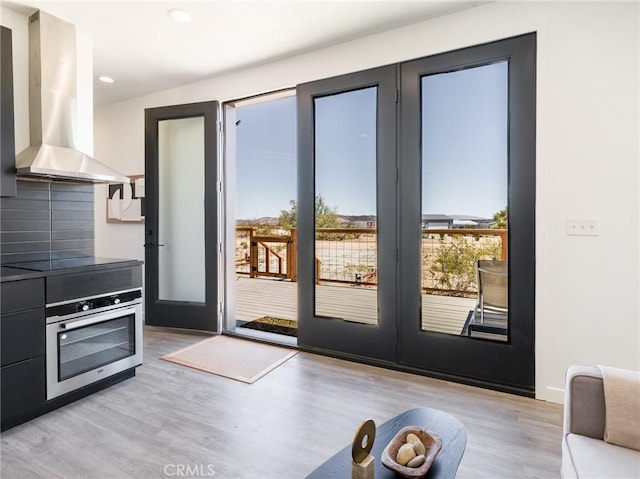 1375 Fortuna Ave, Landers, CA 92285 - doorway to outside with light wood finished floors and recessed lighting