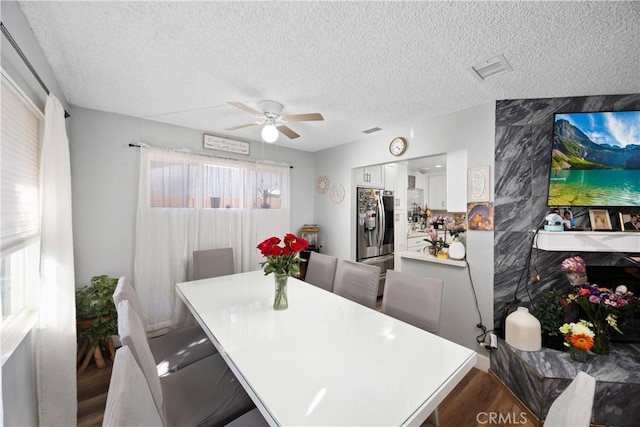1118 Kwis Ave, Hacienda Heights, CA 91745 - dining room with a ceiling fan, wood finished floors, and a textured ceiling