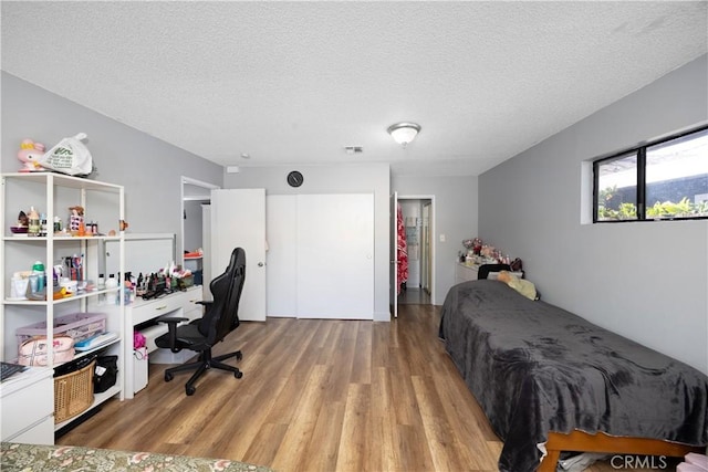 1118 Kwis Ave, Hacienda Heights, CA 91745 - bedroom featuring light wood-style floors and a textured ceiling