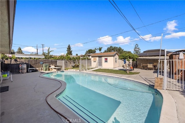 1118 Kwis Ave, Hacienda Heights, CA 91745 - view of pool with a fenced backyard, a patio area, an outdoor structure, and a diving board