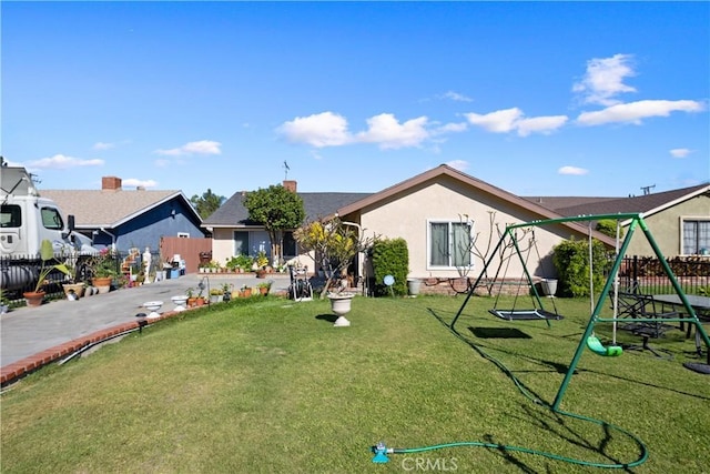 1118 Kwis Ave, Hacienda Heights, CA 91745 - view of front of house with a playground and stucco siding