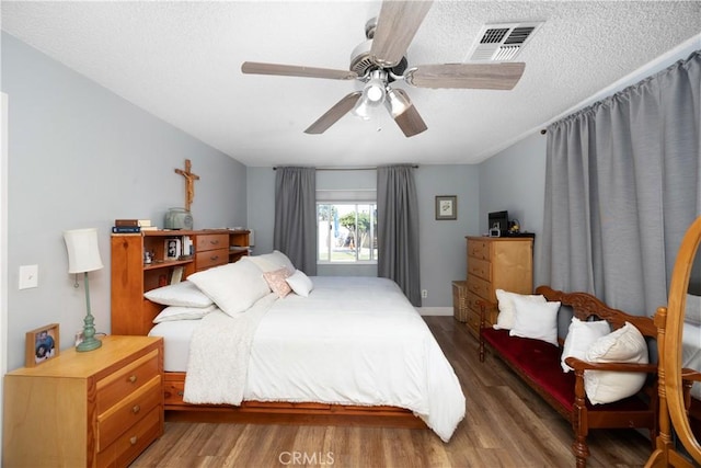 1118 Kwis Ave, Hacienda Heights, CA 91745 - bedroom featuring wood finished floors, a textured ceiling, and ceiling fan