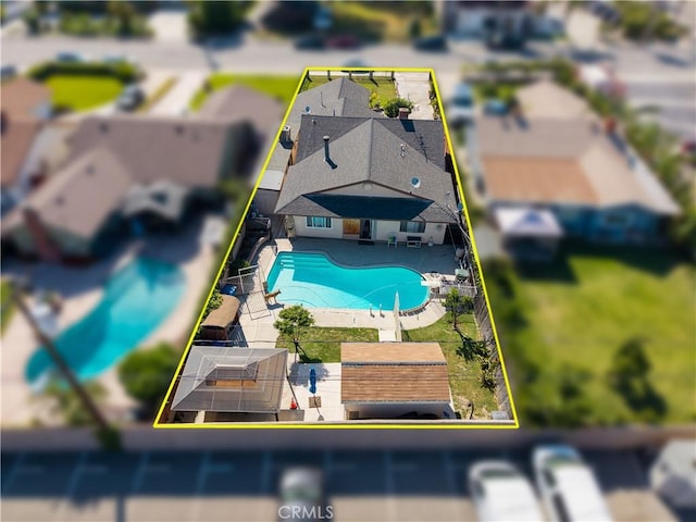 1118 Kwis Ave, Hacienda Heights, CA 91745 - aerial view of property and surrounding area featuring a pool area and property parcel outlined