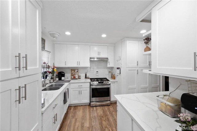 1118 Kwis Ave, Hacienda Heights, CA 91745 - kitchen featuring stainless steel range with gas stovetop, a sink, white cabinetry, recessed lighting, and light wood-style floors