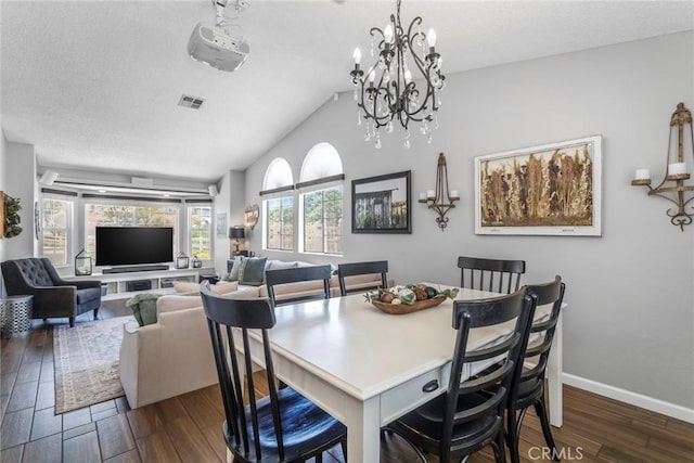 33693 Cattle Creek Rd, Acton, CA 93510 - dining space featuring lofted ceiling, dark wood-style floors, a chandelier, baseboards, and a textured ceiling