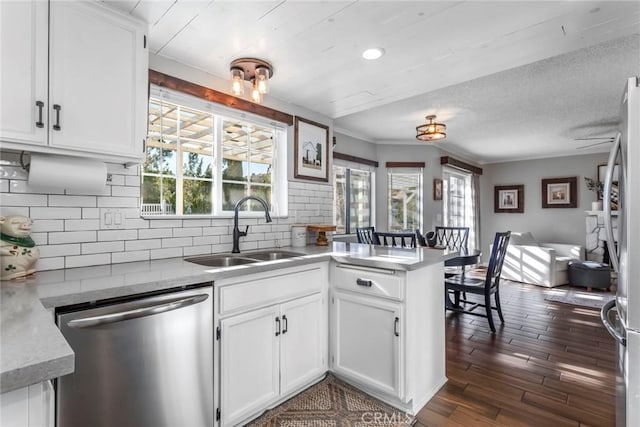 33693 Cattle Creek Rd, Acton, CA 93510 - kitchen featuring appliances with stainless steel finishes, a sink, a peninsula, white cabinets, and recessed lighting