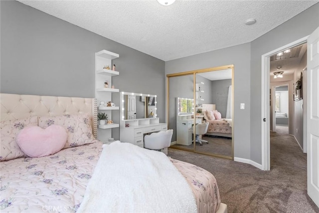 33693 Cattle Creek Rd, Acton, CA 93510 - bedroom featuring carpet, a closet, a textured ceiling, and baseboards
