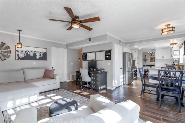 33693 Cattle Creek Rd, Acton, CA 93510 - living room featuring dark wood-style flooring, a desk, a textured ceiling, ceiling fan, and baseboards