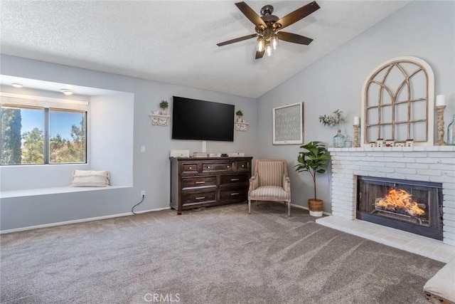 33693 Cattle Creek Rd, Acton, CA 93510 - sitting room featuring carpet floors, ceiling fan, a fireplace, lofted ceiling, and baseboards