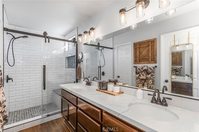 33693 Cattle Creek Rd, Acton, CA 93510 - full bathroom with a stall shower, double vanity, and wood finished floors