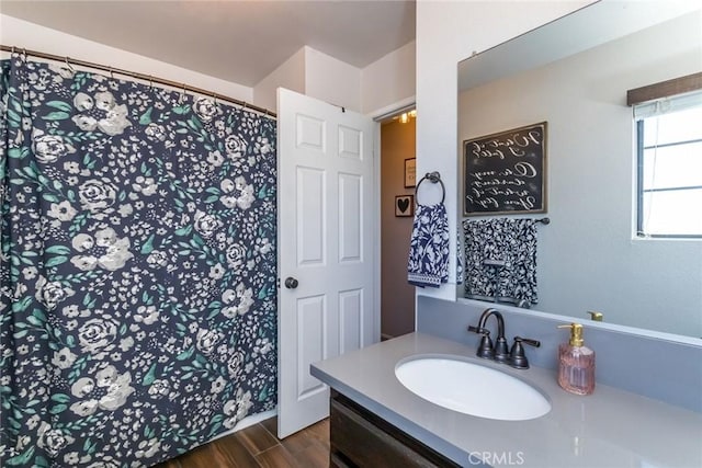33693 Cattle Creek Rd, Acton, CA 93510 - full bathroom featuring vanity, wood finished floors, and a shower with shower curtain