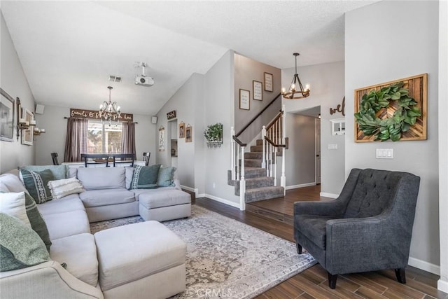 33693 Cattle Creek Rd, Acton, CA 93510 - living room with a chandelier, dark wood finished floors, stairway, lofted ceiling, and baseboards