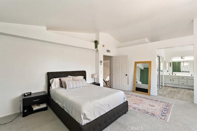 6517 Via Del Prado, Chino Hills, CA 91709 - carpeted bedroom featuring a sink, ensuite bath, and vaulted ceiling