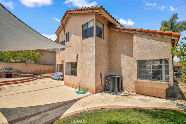 6517 Via Del Prado, Chino Hills, CA 91709 - rear view of house featuring central AC, stucco siding, a patio area, and a tiled roof