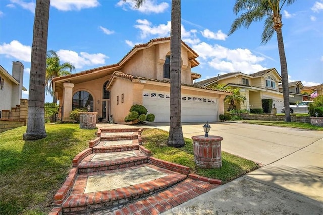 6517 Via Del Prado, Chino Hills, CA 91709 - mediterranean / spanish-style house with an attached garage, concrete driveway, stucco siding, and a front yard