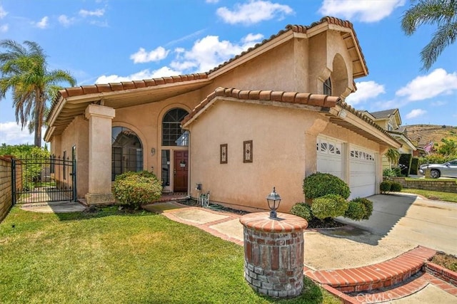 6517 Via Del Prado, Chino Hills, CA 91709 - mediterranean / spanish home featuring driveway, stucco siding, a gate, a garage, and a tile roof