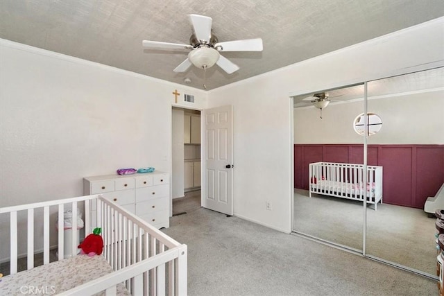 6517 Via Del Prado, Chino Hills, CA 91709 - bedroom with carpet flooring, a closet, a nursery area, a ceiling fan, and crown molding