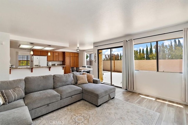 6517 Via Del Prado, Chino Hills, CA 91709 - living room featuring healthy amount of natural light and light wood-type flooring