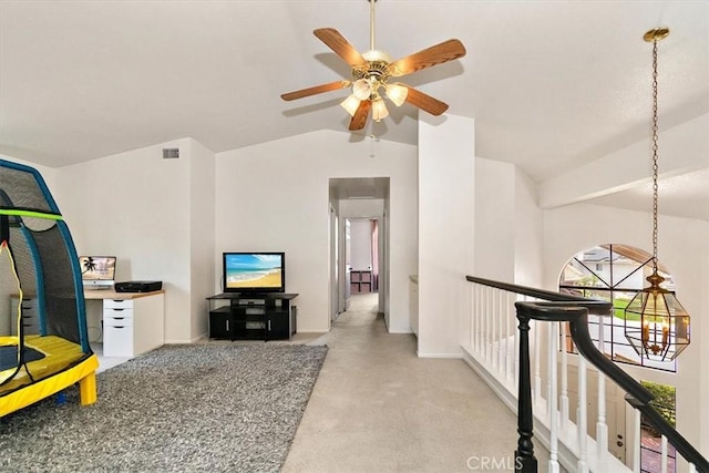 6517 Via Del Prado, Chino Hills, CA 91709 - living area featuring lofted ceiling, ceiling fan, plenty of natural light, carpet floors, and baseboards