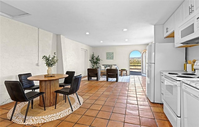 31303 Andres Pico Rd, San Juan Capistrano, CA 92675 - dining space with light tile patterned flooring and recessed lighting