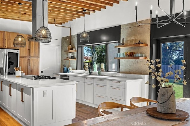 31303 Andres Pico Rd, San Juan Capistrano, CA 92675 - kitchen with open shelves, a sink, light countertops, appliances with stainless steel finishes, and light wood-style floors