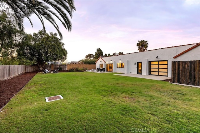 31303 Andres Pico Rd, San Juan Capistrano, CA 92675 - view of yard featuring a garage and a patio area