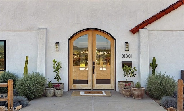 31303 Andres Pico Rd, San Juan Capistrano, CA 92675 - doorway to property with french doors and stucco siding