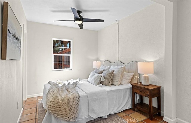 31303 Andres Pico Rd, San Juan Capistrano, CA 92675 - tiled bedroom with baseboards and a ceiling fan